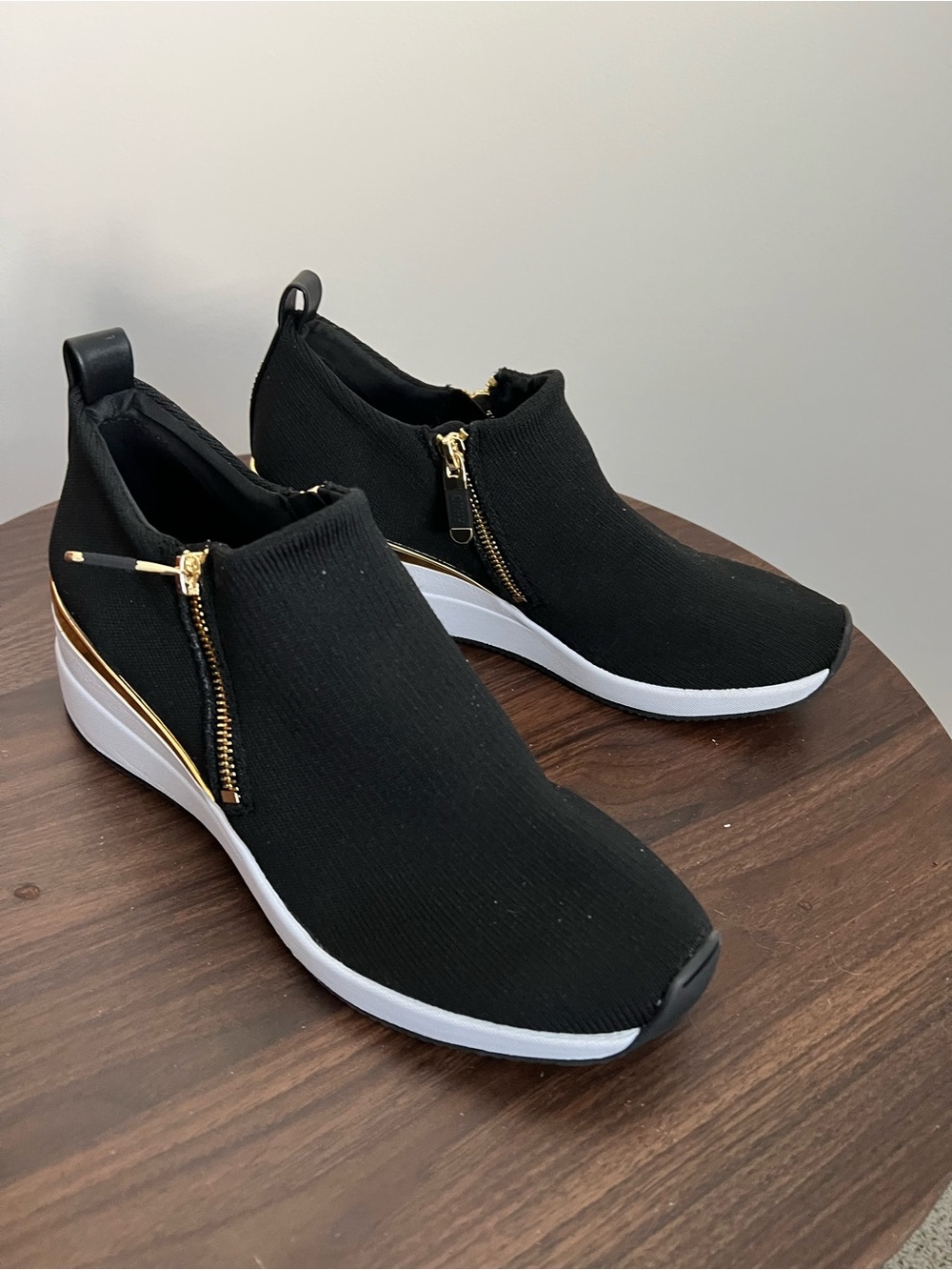 DKNY Black Knit Wedge Slip-On Sneakers with Gold Zipper Trim